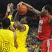 Michigan freshman Glenn Robinson III is stripped of the ball from behind by Ohio State sophomore Amir WIlliams during the second half at Crisler Center on Tuesday, Feb. 5. Melanie Maxwell I AnnArbor.com